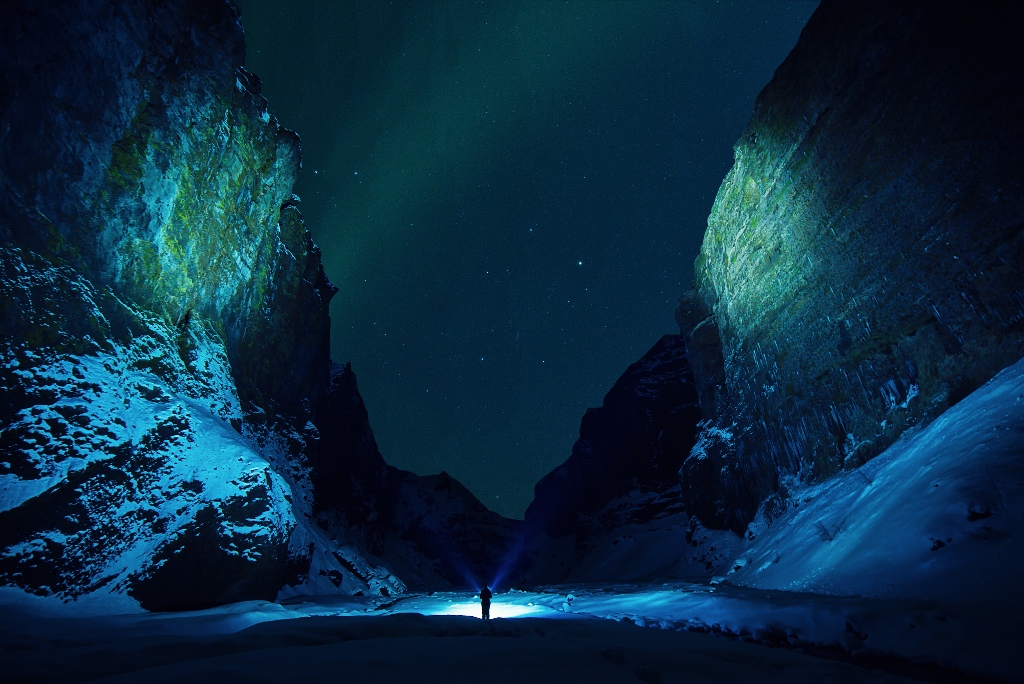 night sky with man looking into the darkness